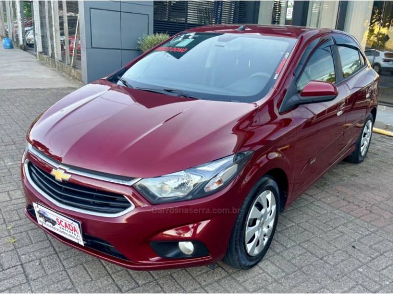 CHEVROLET - ONIX - 2016/2017 - Vinho - R$ 55.900,00