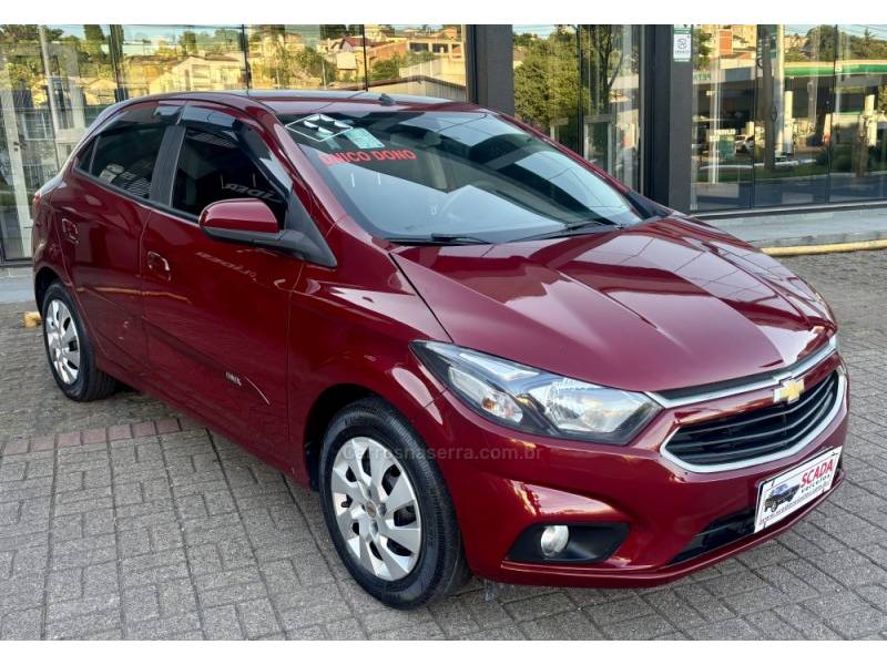 CHEVROLET - ONIX - 2016/2017 - Vinho - R$ 55.900,00